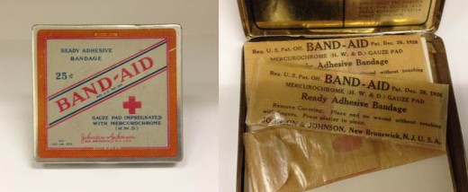 BAND-AID® Brand Adhesive Bandages tin from 1926 and its contents, donated by J.S.