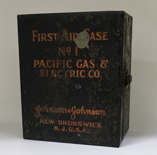 Rare Johnson & Johnson First Aid Kit made for the Pacific Gas & Electric Company, from our archives. The weathered condition of this very sturdy kit reflects the many decades it was in use by the family who received it.