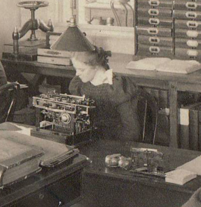 Johnson & Johnson office employee in 1895 -- with a typewriter!