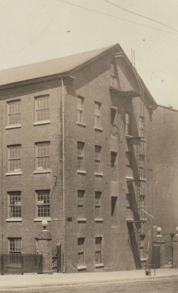 A Johnson & Johnson building, circa 1912, with a fire escape.