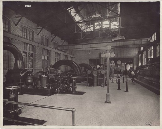 Panoramic interior view of the Powerhouse in 1919, from our archives.  Note the pressed tin ceiling, the gantry crane, and check out those indoor streetlamps!  Maybe we can reintroduce them as a lighting trend!