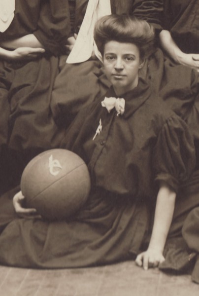 Emma T--- holding a basketball in 1907. From our archives.